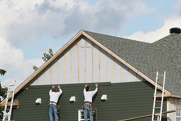 Professional Siding Installation technician working in Greenville, TX